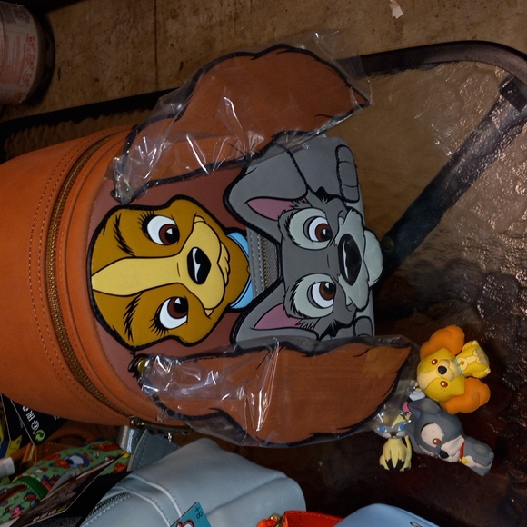 Loungefly Handbags - Disney lady and the tramp loungefly mini backpack with keychains